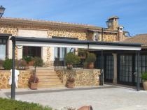 PORTERIA CON TOLDO EXTENSIBLE